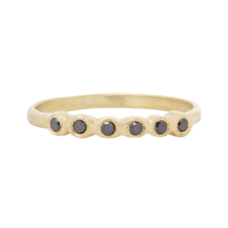 Don't Miss These Dazzling Jewelry Discounts Half pebble band with black diamonds