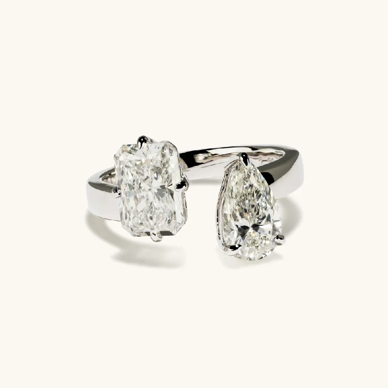 Shop Dazzling Jewelry With Special Promotional Discounts Radiant and Pear Toi et Moi Lab Diamond Engagement Ring Shop Dazzling Jewelry With Special Promotional Discounts Radiant and Pear Toi et Moi Lab Diamond Engagement Ring
