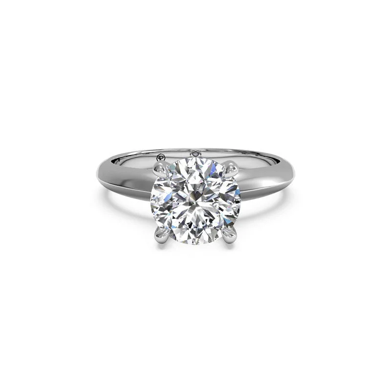 Shop Jewelry That Shines Without The High Price Knife-Edge Surprise Diamond Round Diamond Engagement Ring Shop Jewelry That Shines Without The High Price Knife-Edge Surprise Diamond Round Diamond Engagement Ring