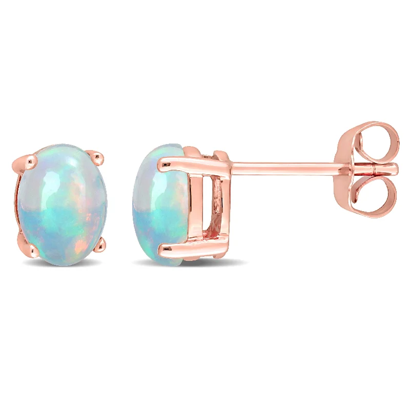 Shop Modern Jewelry Collections With Exclusive Discounts 1 3/8 CT TGW Oval Shape Blue Ethiopian Opal Stud Earrings in 10K Rose Gold Shop Modern Jewelry Collections With Exclusive Discounts 1 3/8 CT TGW Oval Shape Blue Ethiopian Opal Stud Earrings in 10K Rose Gold