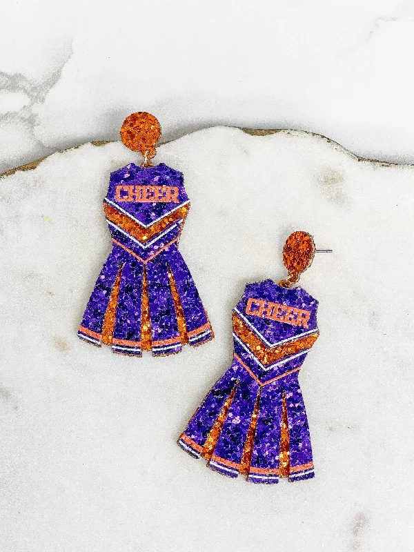 Seasonal Jewelry Deals – Elevate Your Style Glitter Cheerleader Dress Dangle Earrings - Orange & Purple Seasonal Jewelry Deals – Elevate Your Style Glitter Cheerleader Dress Dangle Earrings - Orange & Purple