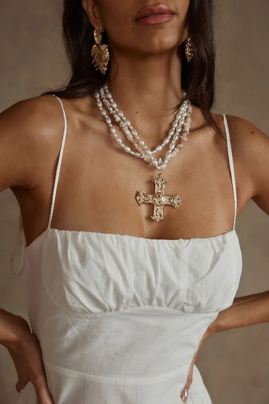 Affordable Luxury Jewelry For Every Occasion Angelica Gold Pearl Cross Statement Necklace