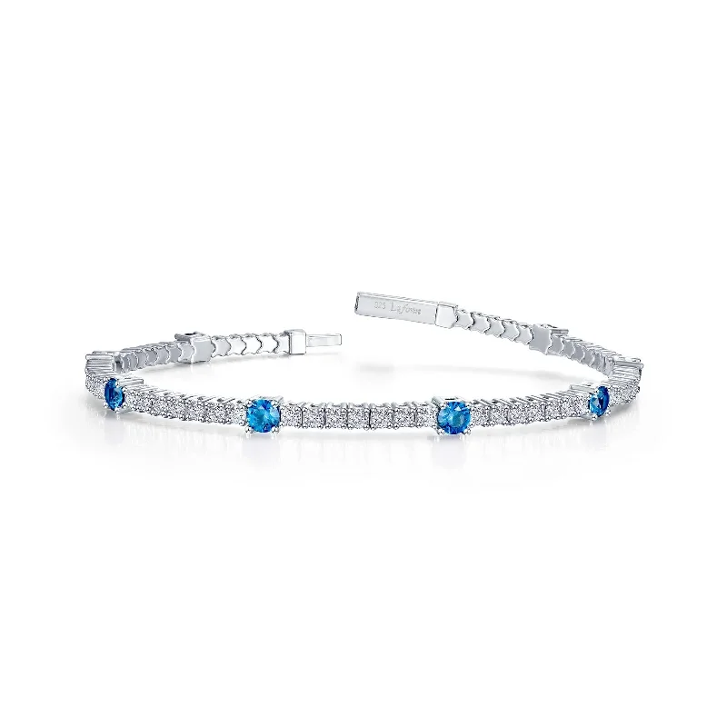 Shop Handcrafted Jewelry At Special Promotional Rates Flexible Blue Topaz Bracelet in Sterling Silver Shop Handcrafted Jewelry At Special Promotional Rates Flexible Blue Topaz Bracelet in Sterling Silver