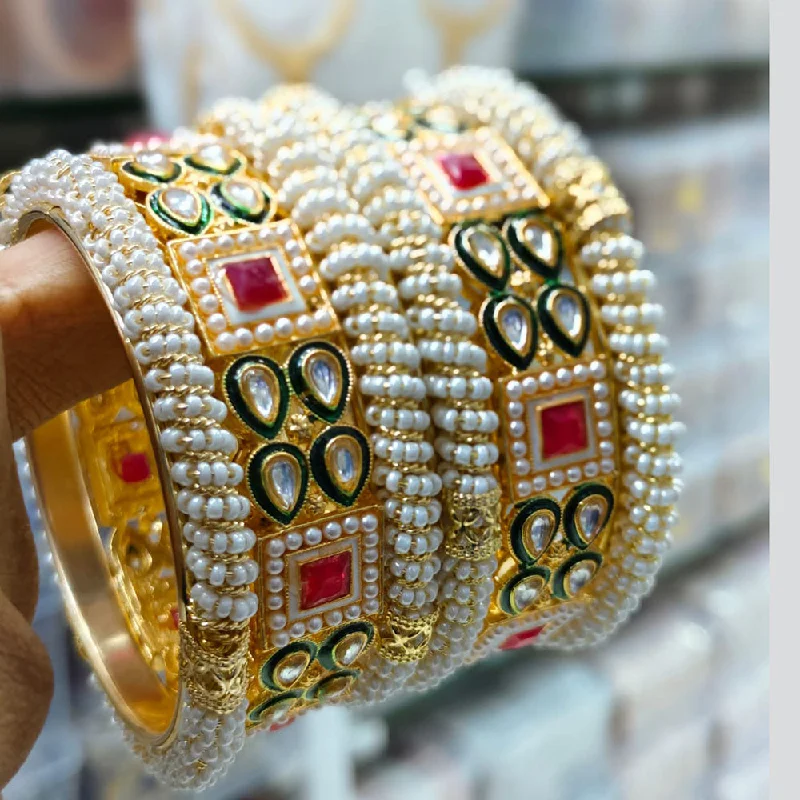 Unique Jewelry Designs Now At Discounted Rates Kavita Art Gold Plated Kundan Stone And Pearls Bangles Set Unique Jewelry Designs Now At Discounted Rates Kavita Art Gold Plated Kundan Stone And Pearls Bangles Set