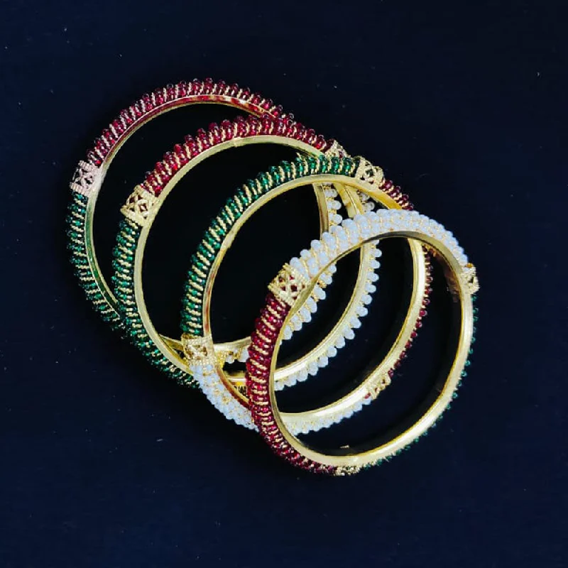 Buy More, Save More – Special Jewelry Discounts Pooja Bangles Gold Plated Pearls Bangle Set Buy More, Save More – Special Jewelry Discounts Pooja Bangles Gold Plated Pearls Bangle Set